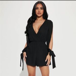 Brand new with tags. Fashion nova black romper. Size large. Chiffon